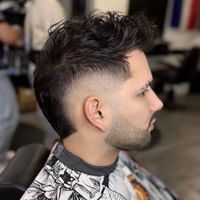 Textured quiff with a burst fade